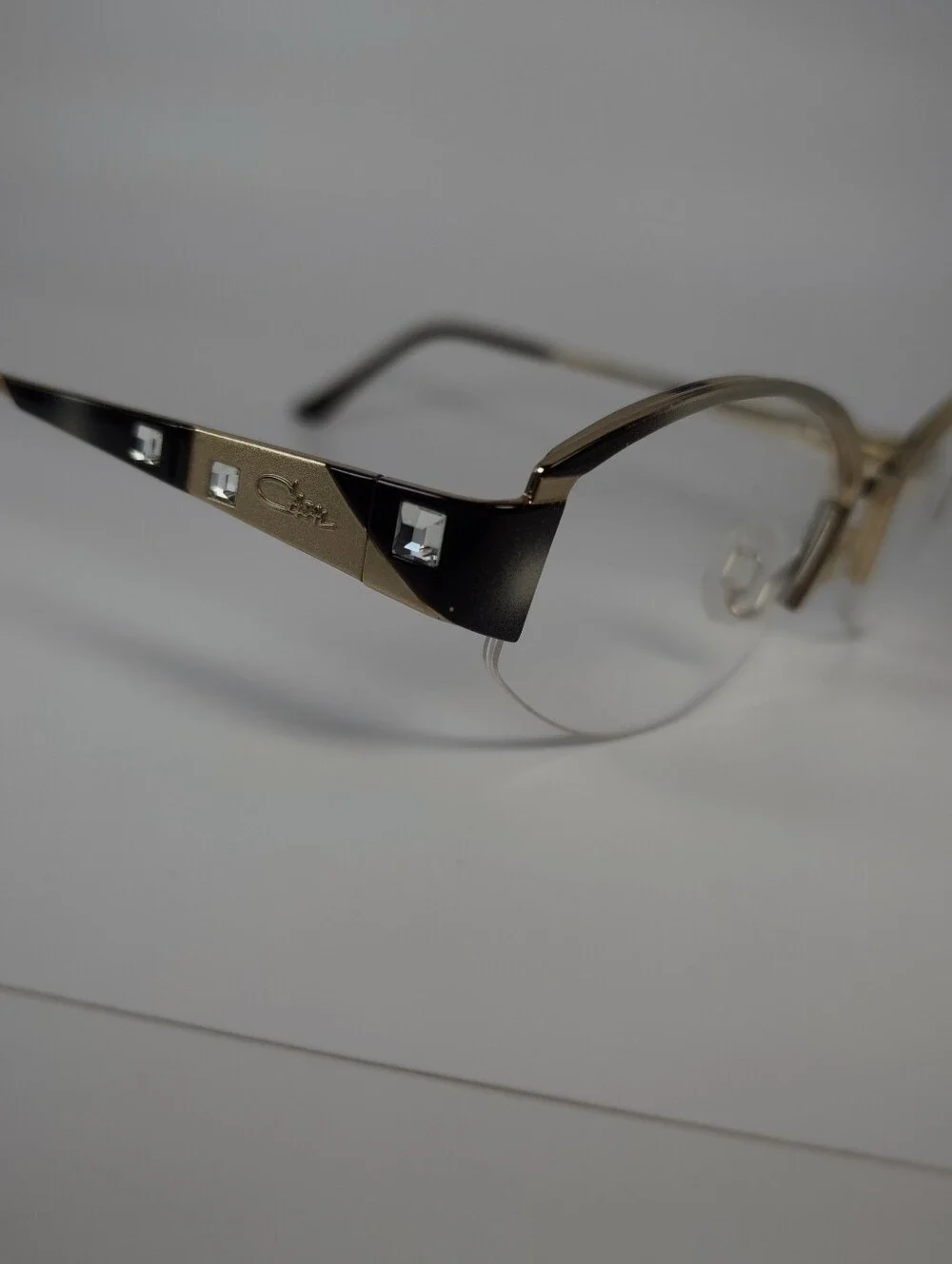 Cazal. Gold and Black Semi-Rimless Women’s Eyeglasses. Germany